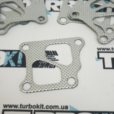 Прокладка для турбины на Mitsubishi Lancer Evo 7, 8, 9 Прокладка для турбины на Mitsubishi Lancer Evo 7, 8, 9